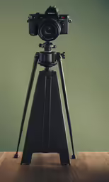an artistic camera with a tripod for video
