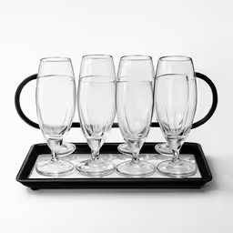 six wine glasses sitting on top of a tray