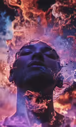 man looking up at sky with many swirling clouds