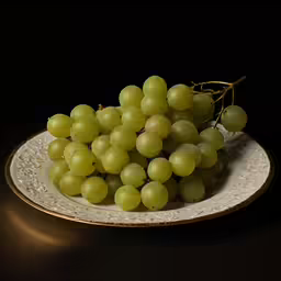 a plate that has some grapes on it