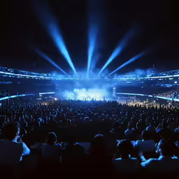 a large crowd in the middle of an arena