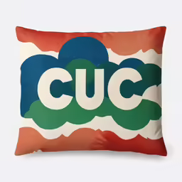 a colorful pillow with the word cuc printed on it