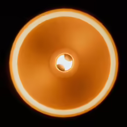 a yellow light fixture with a dark background
