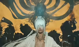 a man is in front of some people and he has long hair and white makeup