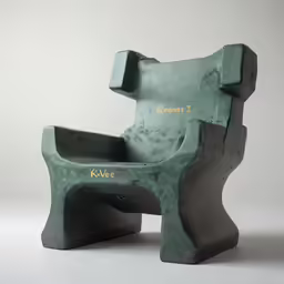 the green sculpture is next to the black chair
