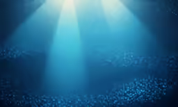 the light shines in from the blue ocean surface