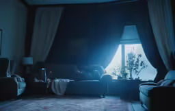 a person in a living room sitting on a couch