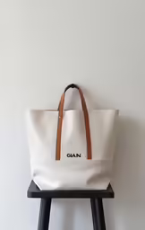 an image of a tote bag on a stool
