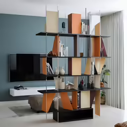 a large modern tv set with shelves and cabinets