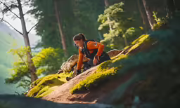 the man is hiking up the hill in the forest