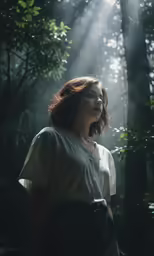 the woman with red hair stands in front of a forest