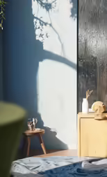 an object is standing next to a wood table with a plant on it