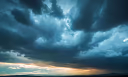 a cloudy sky is pictured as it appears to have been seen