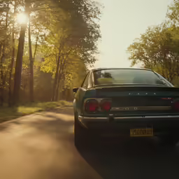 a vintage car on the side of the road