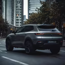 a gray bmw suv in the middle of the street