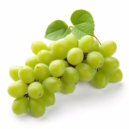 some green grapes with some leaves on them