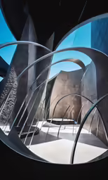 the metal sculpture is reflecting in the window