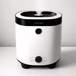 the rice cooker is on the table