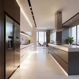 the large kitchen features many stainless steel appliances