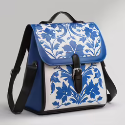 a bag with a floral design on the side and strap