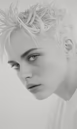 black and white photo of boy with blonde hair