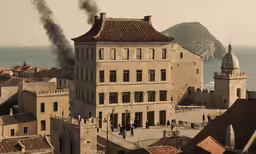 smoke is pouring out of the chimneys of the building