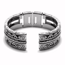 an intricate silver bracelet with the clasp open