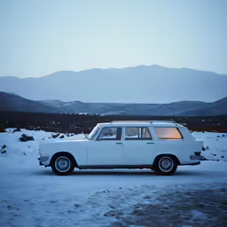 a car parked on top of snow covered ground