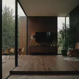 the empty living room is very dark and empty