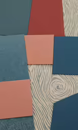 an array of different color samples on top of a wooden surface
