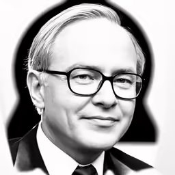 a black and white photo of a man with glasses
