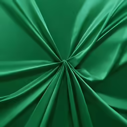 a dark green background with very intricate folds