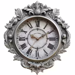 the clock is in a decorative silver frame