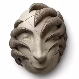 a mask is shaped like a demon with horns on it