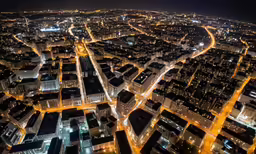 view from the air of a city in the night