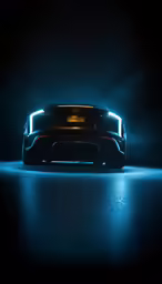 a very fancy sports car parked in the dark