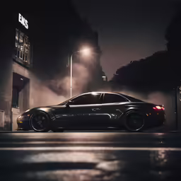 a black car is parked by the street