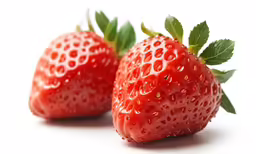 two fresh strawberries on a white background