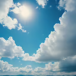 a bright sun is shining brightly over the ocean