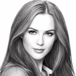 a woman with long hair in a black and white photo