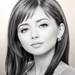 a black and white image of a woman
