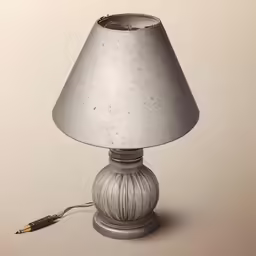 a small silver lamp is hooked up to a white wire