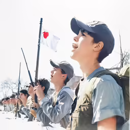 several people on a hill with guns and uniforms