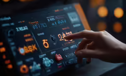 someone pressing the button on a control panel