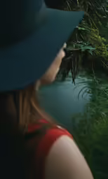 the person is looking out over the water