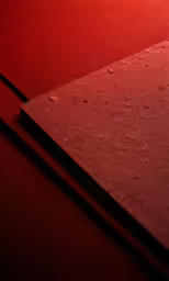a photo of red material with black trim