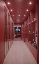 a red hallway with lots of glass shelves full of watches