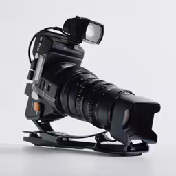 an image of a camera with some lights attached to it