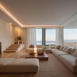a living room with an open fire place and stairs