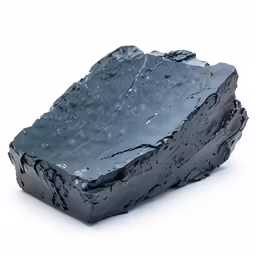 a black piece of slate is shown against a white background